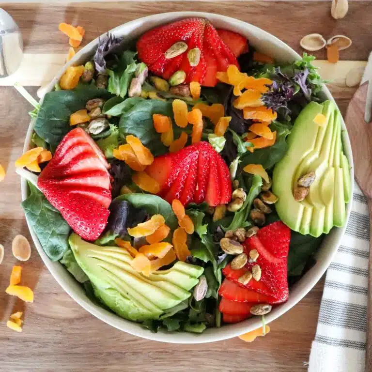Strawberry spring mix salad up close.