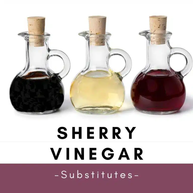 Three glass containers of vinegar.