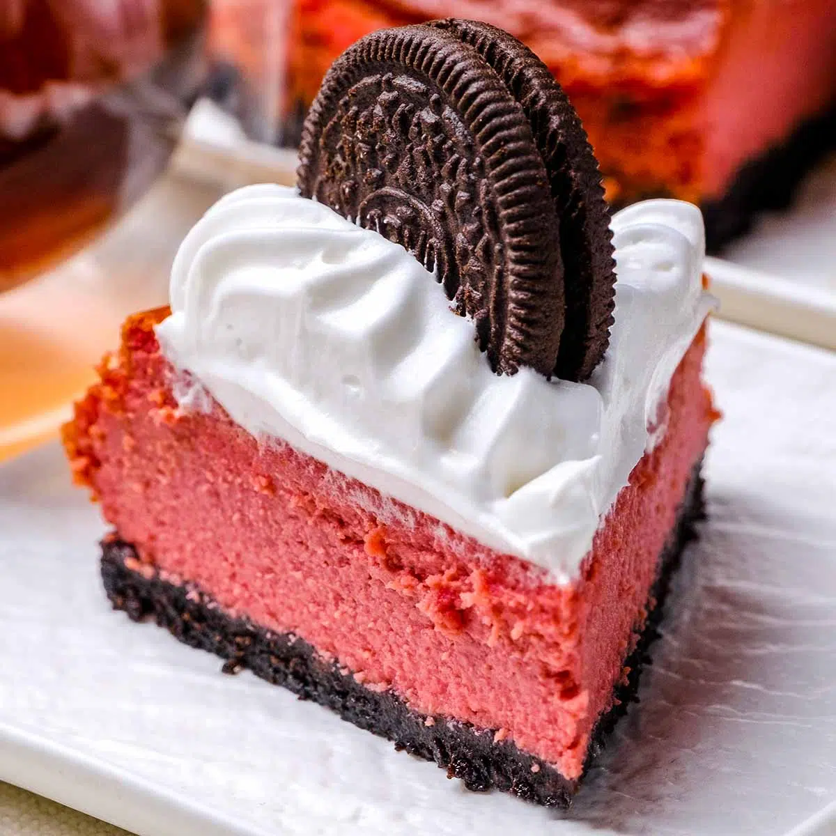 Slice of Oreo red velvet cheesecake. 