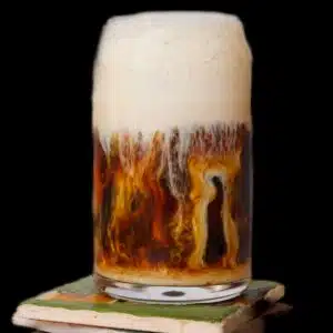 Sweet cream cold foam melting into ice cofee.