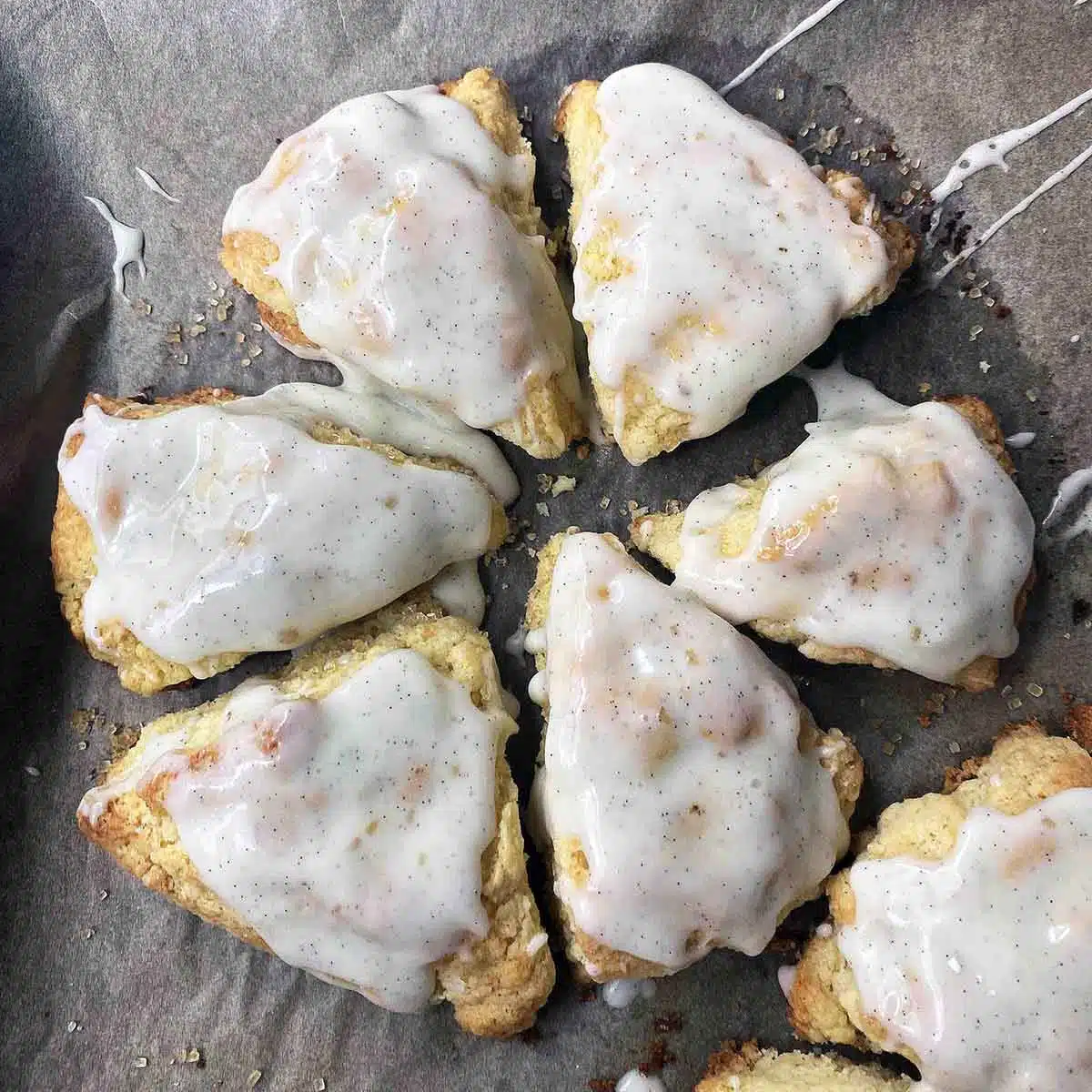 Decorated scones on a tray.