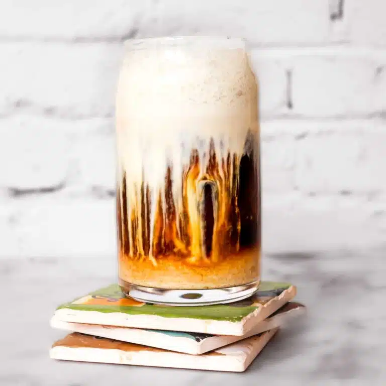Vanilla sweet cream cold from dripping into iced coffee.