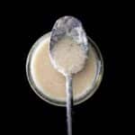 Vegan buttermilk in a spoon.