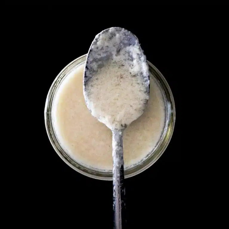 Vegan buttermilk in a spoon.