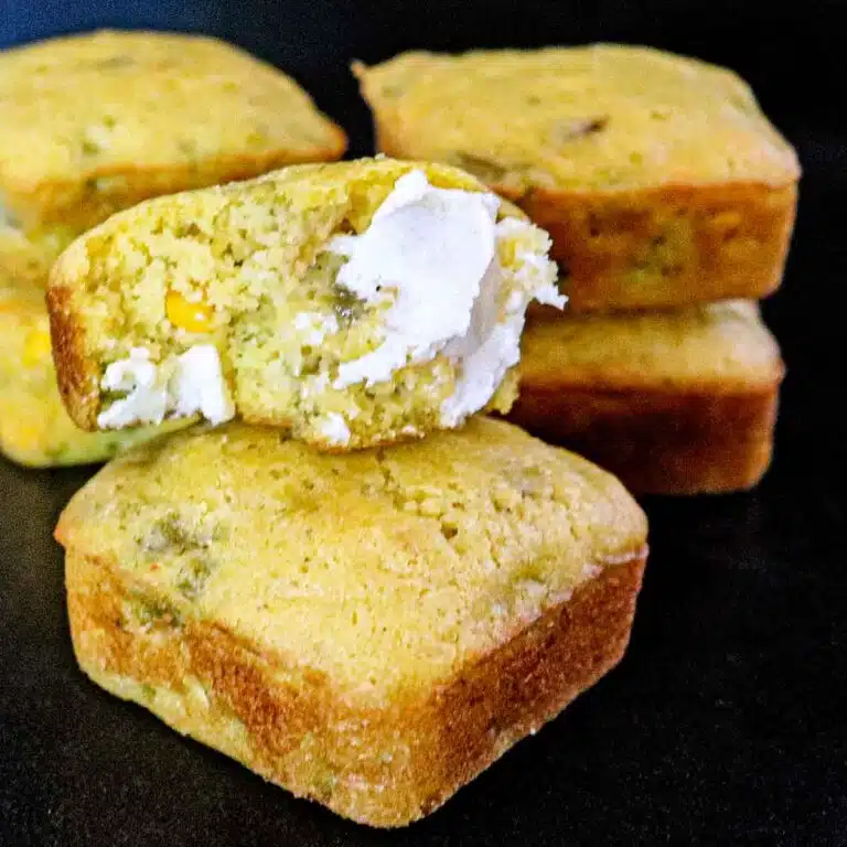 Several green chile cornbread squares.