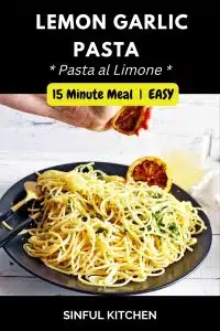 Squeezing lemon onto a plate of pasta.