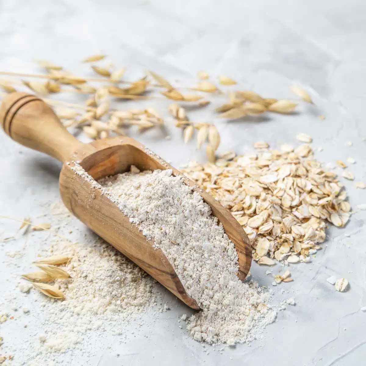 A spoon filled with oat flour.