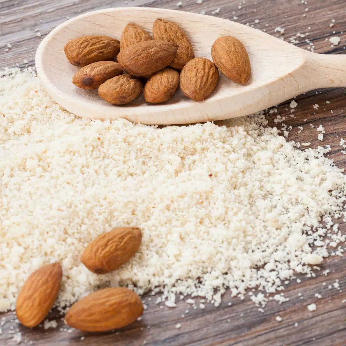Almonds next to almond flour.