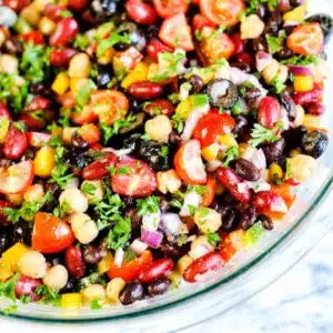 Up close bowl of rainbow bean salad.