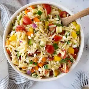 Bowl of orzo salad.
