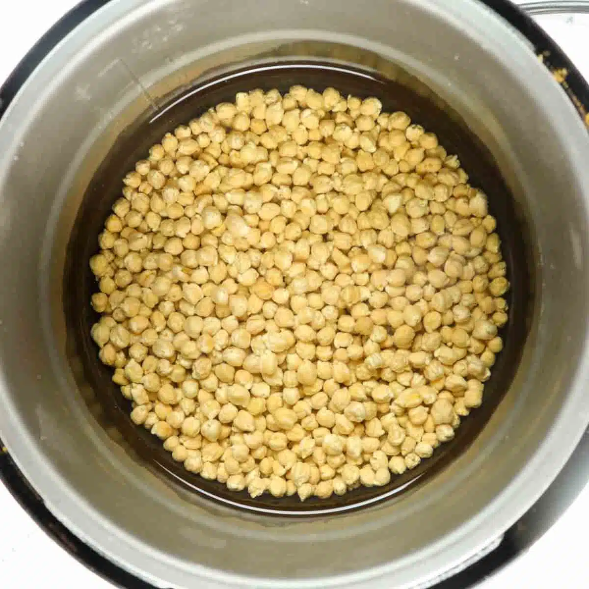 Chickpeas in a bowl to soak overnight.
