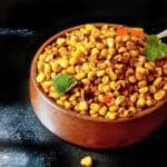 Charred blackened corn in a wooden bowl