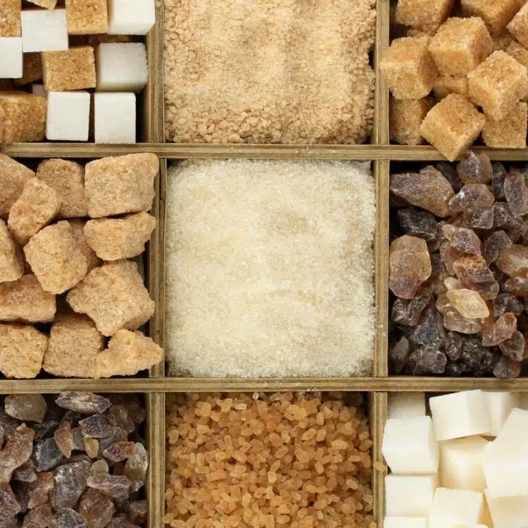 A box filled with different sugars in each compartment.