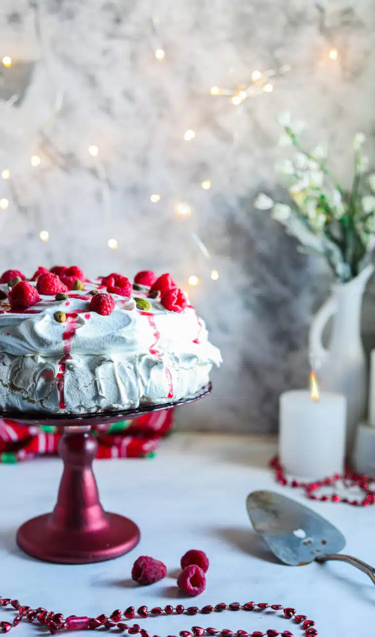 Vegan Pavlova on a stand.