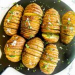 Several potatoes on a tray