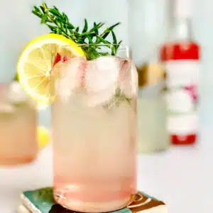 Close up of glass of garnished lemonade.