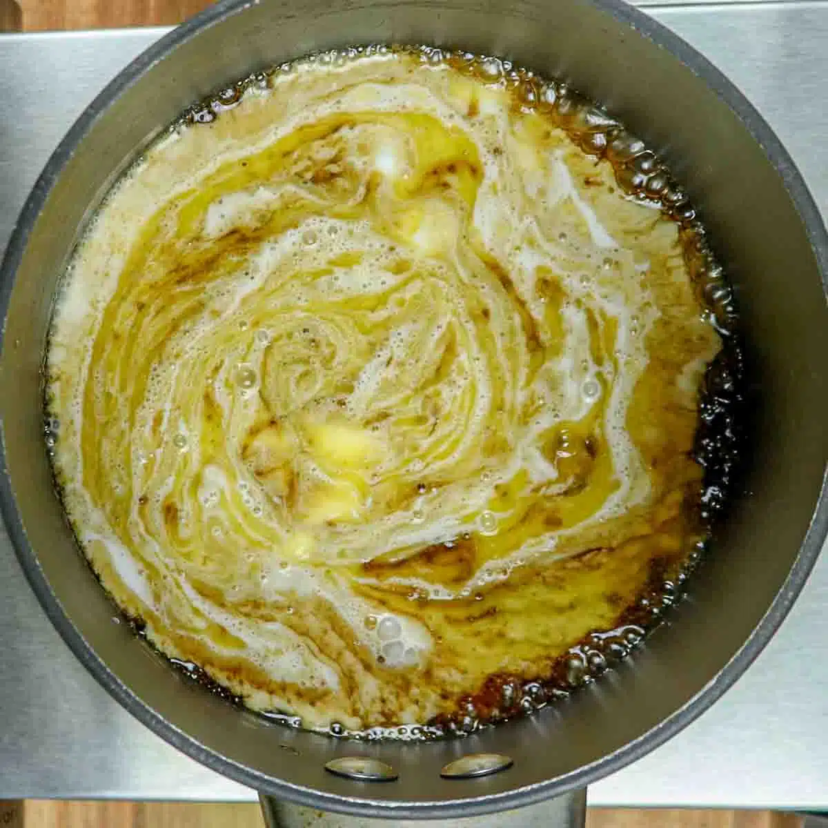 All the ingredients in a saucepan, blending together.