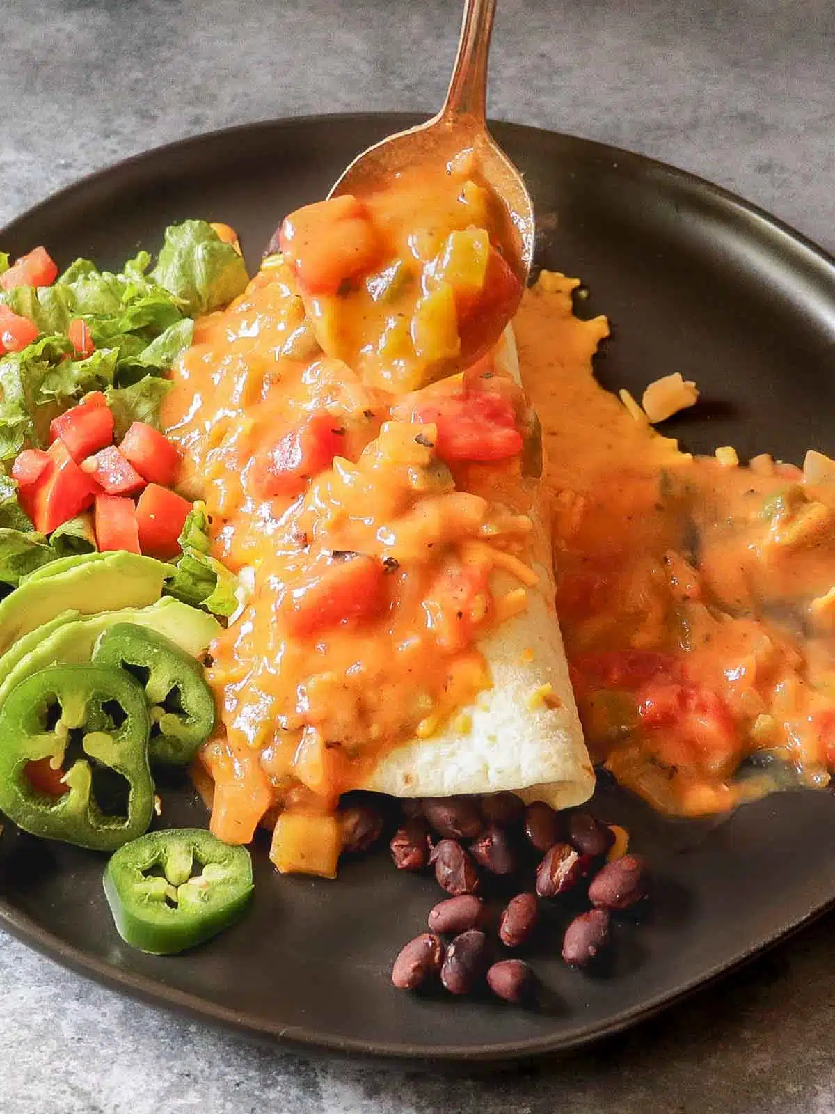 Burrito smothered in Colorado green chile.