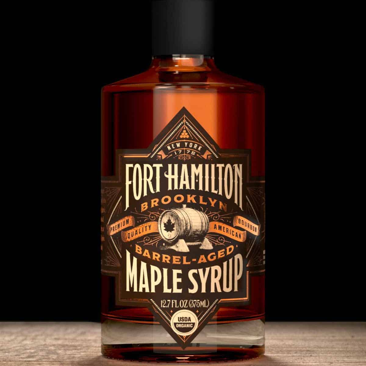 A bottle of Fort Hamilton Barrell-Aged Maple Syrup.