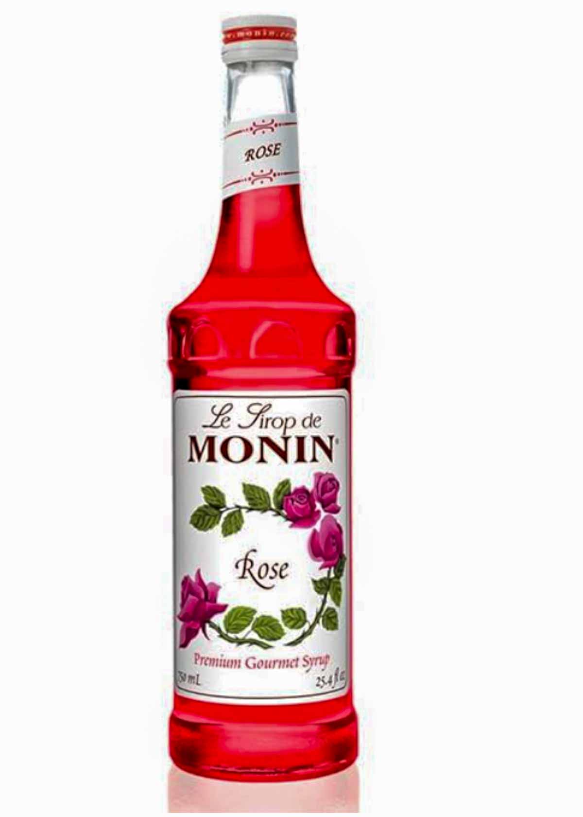 A bottle of Monin Rose Syrup.