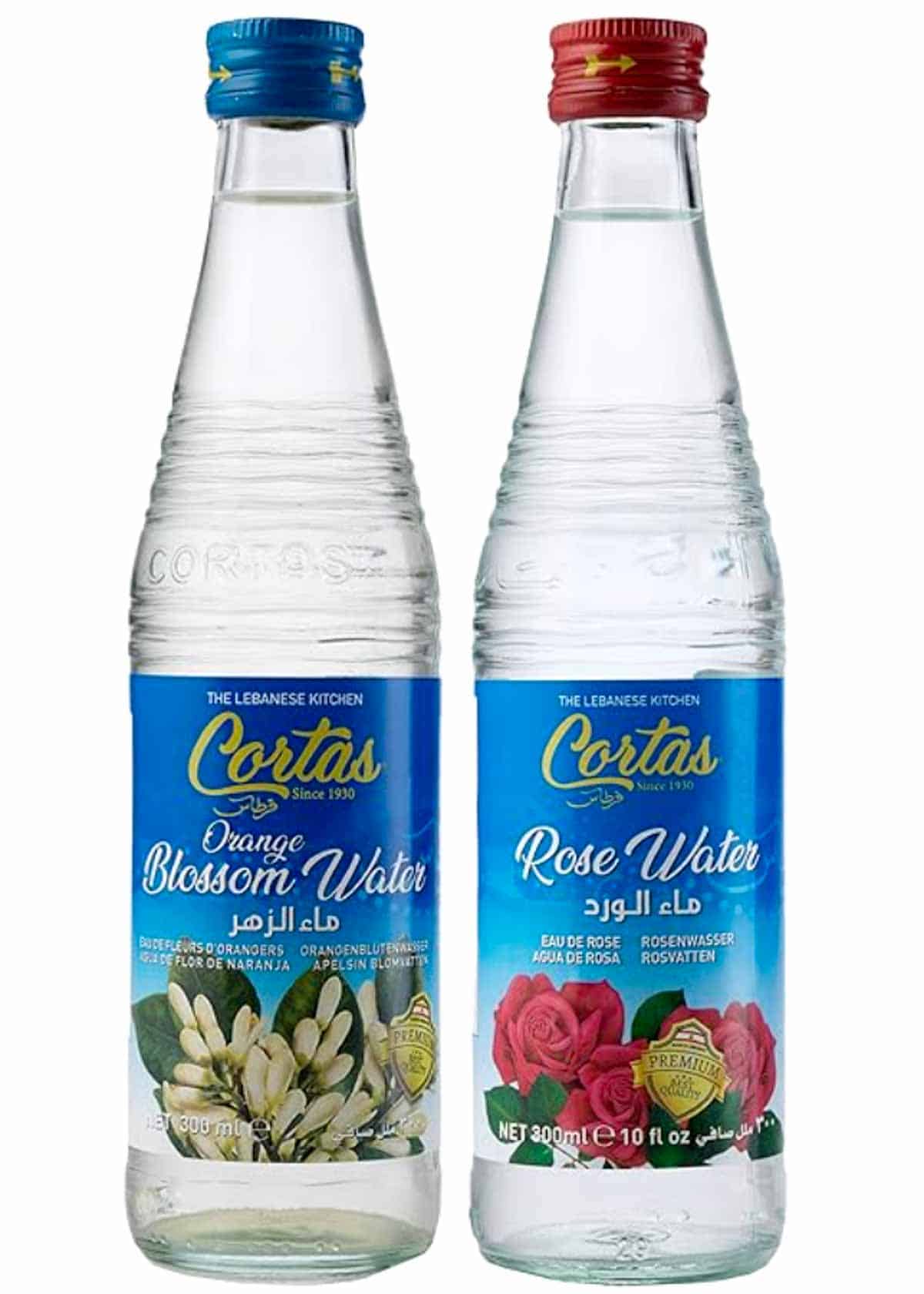 A picture of two waters, one rose and the other orange.