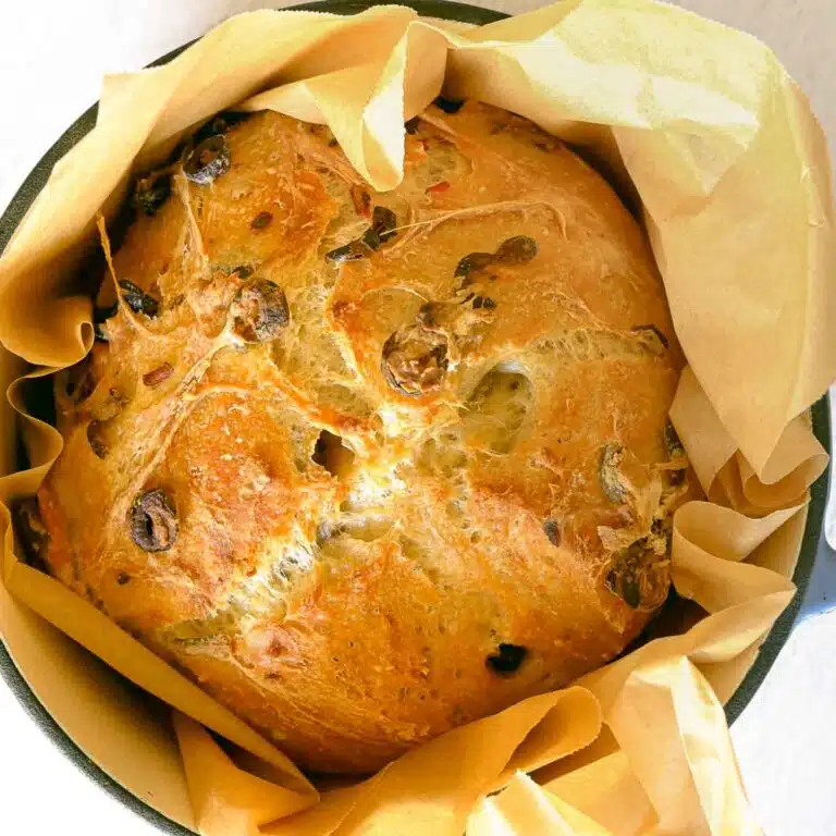 Baked no-knead olive bread in a dutch oven.