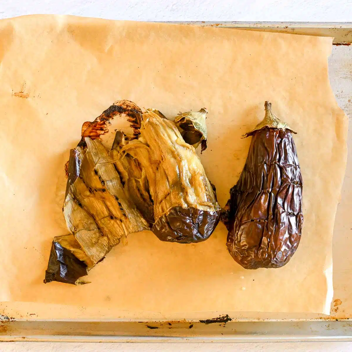 Two eggplants roasted and one peel. 