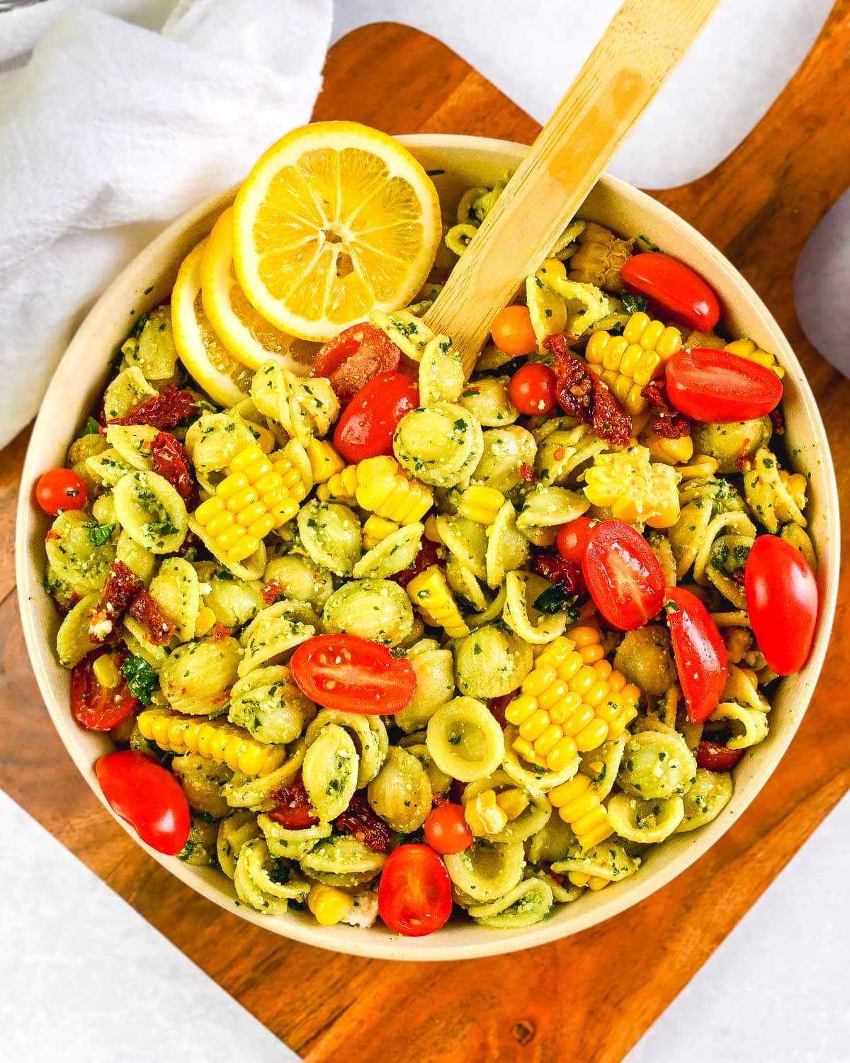 Lemon pesto pasta salad in a large bowl.