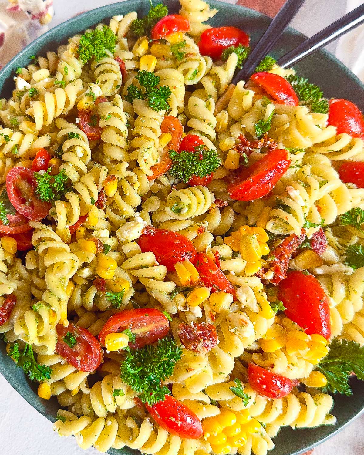 Vegan pasta salad mixed and in a bowl.