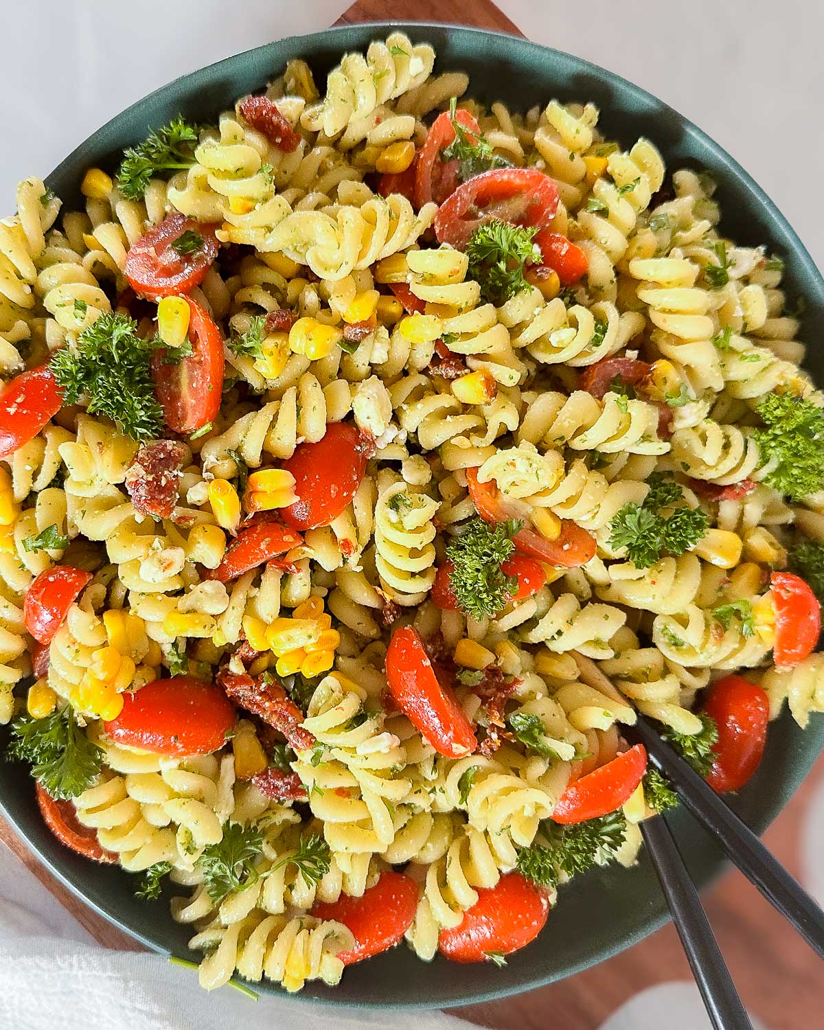 Vegan pasta salad mixed and in a bowl.