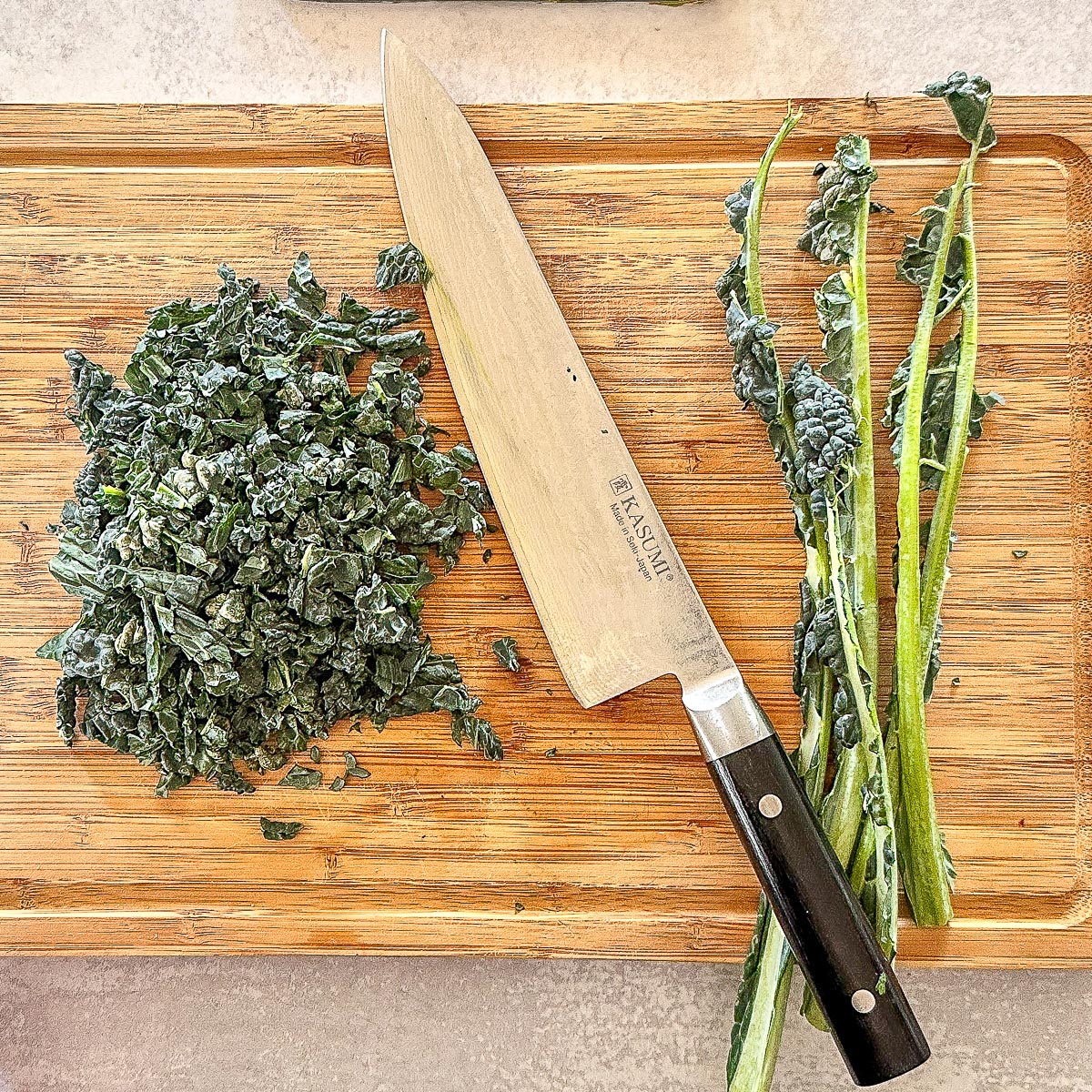 De-stemmed kale that has been chopped into pieaces.