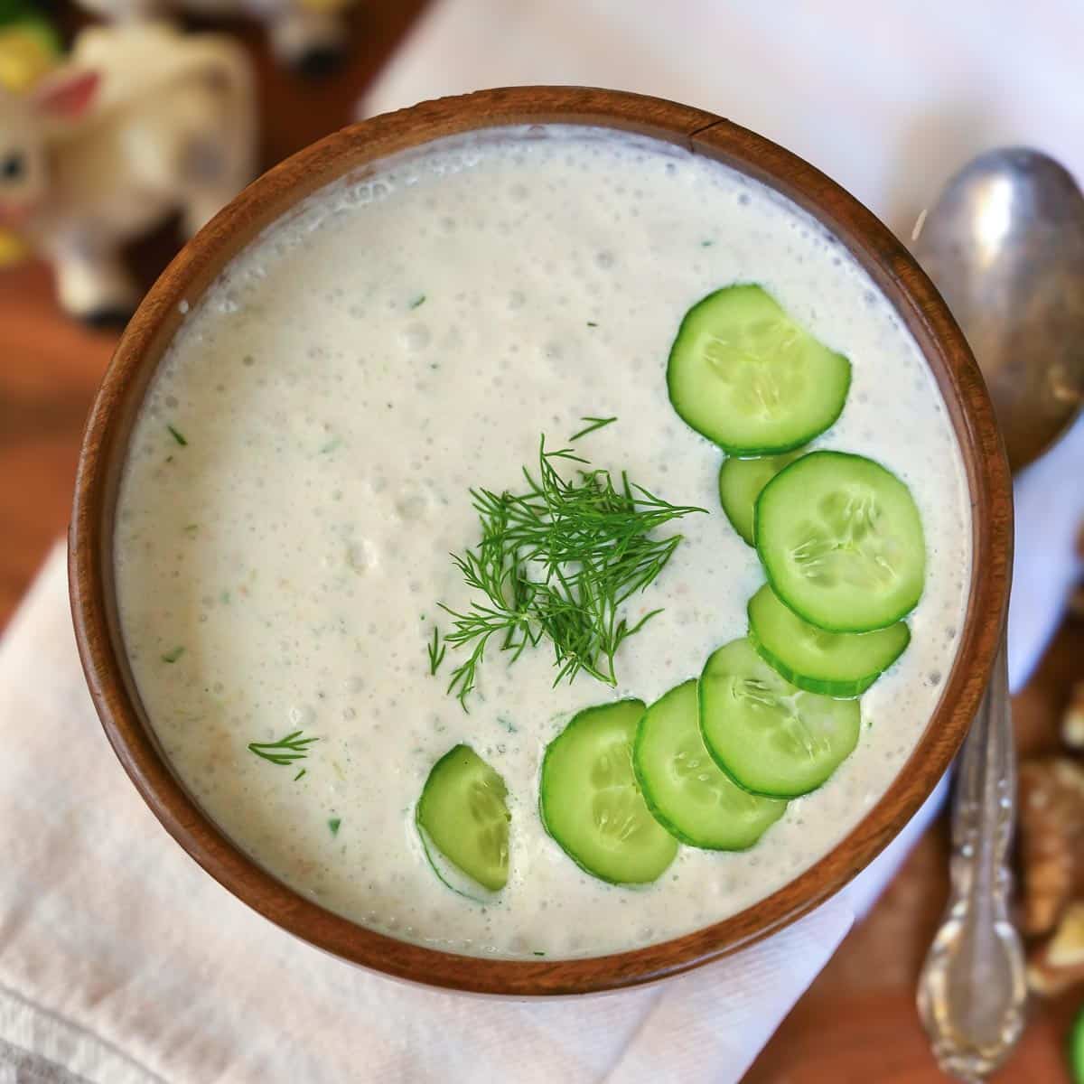 Traditional Bulgarian tarator soup served in a rustic bowl
