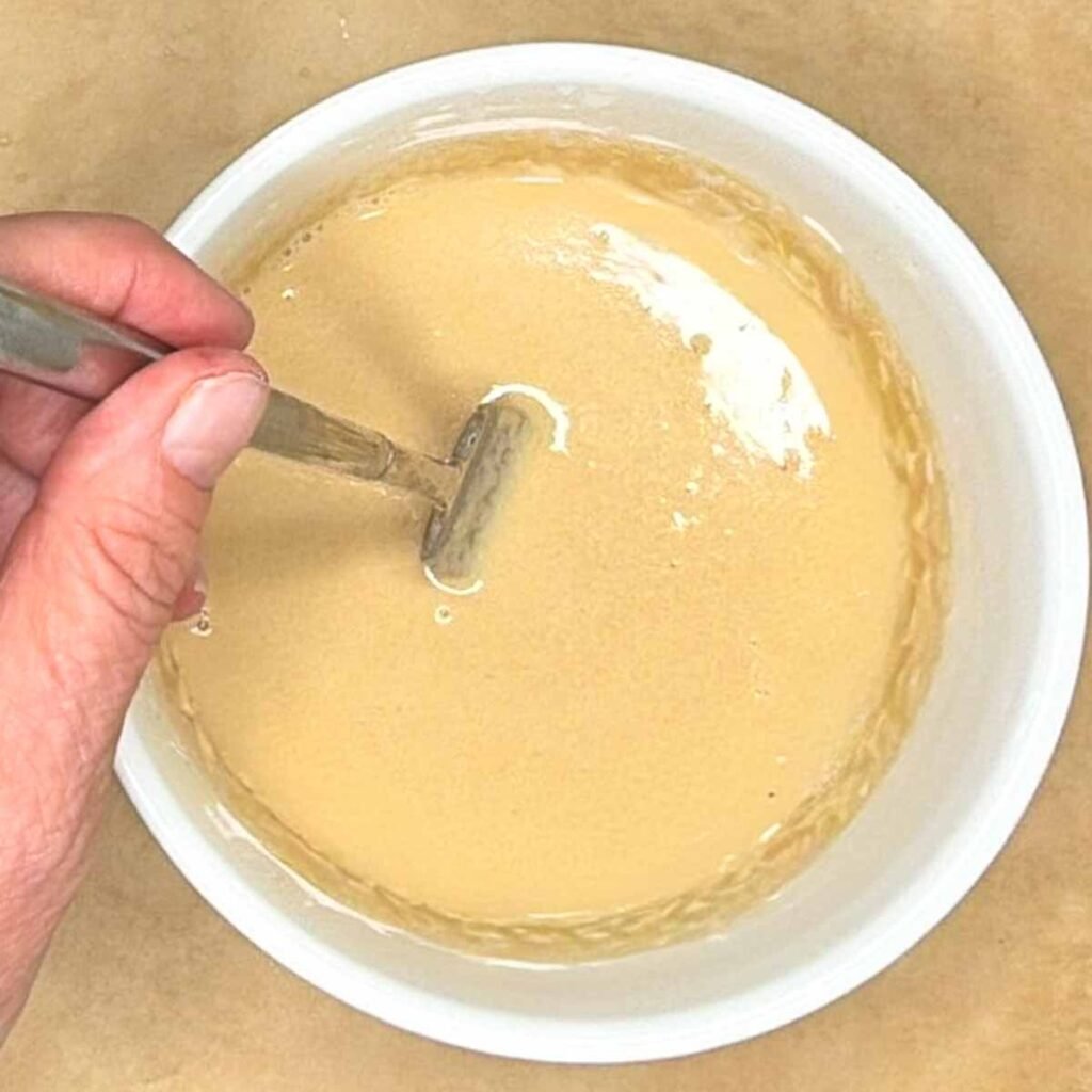 Mixing all the ingredients together.