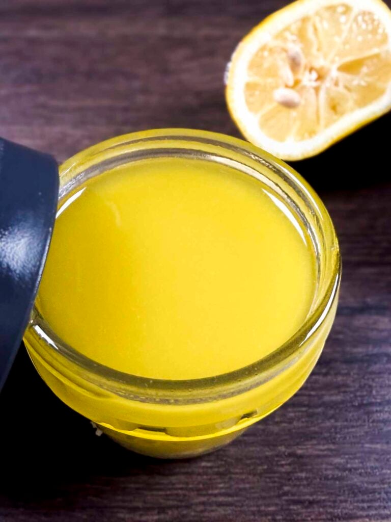 Homemade olive oil, lemon and garlic salad dressing.