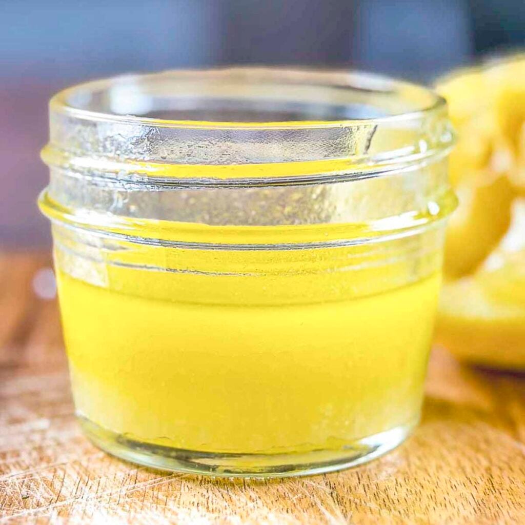 Lemon, garlic, and olive oil dressing are used in making a farro salad.
