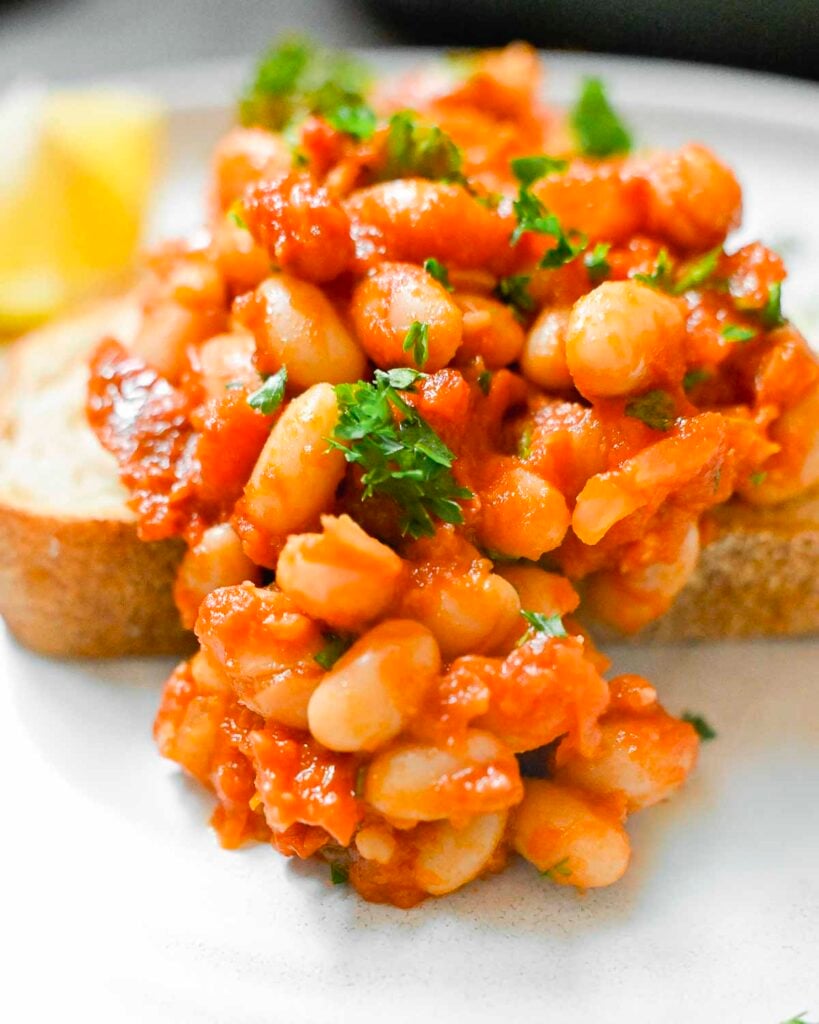Mediterranean white beans on a slice of toast.