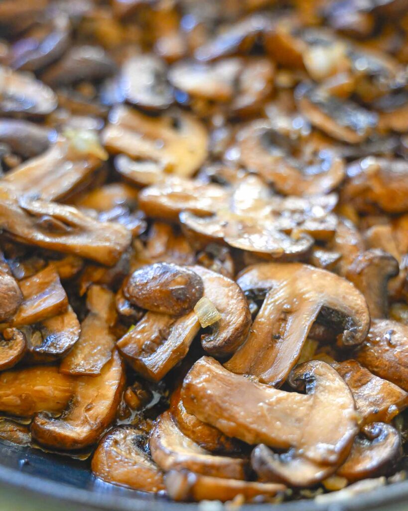 Sautéed Mushrooms in a cast iron skillet.